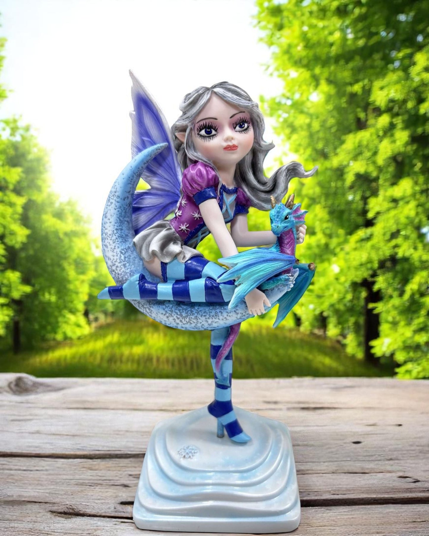 Fairy with Dragon Sitting on Moon