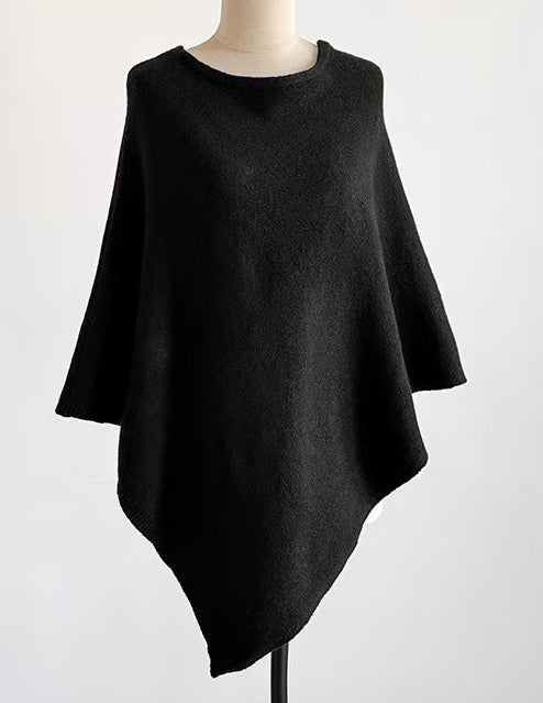 Poncho with ribbed edge