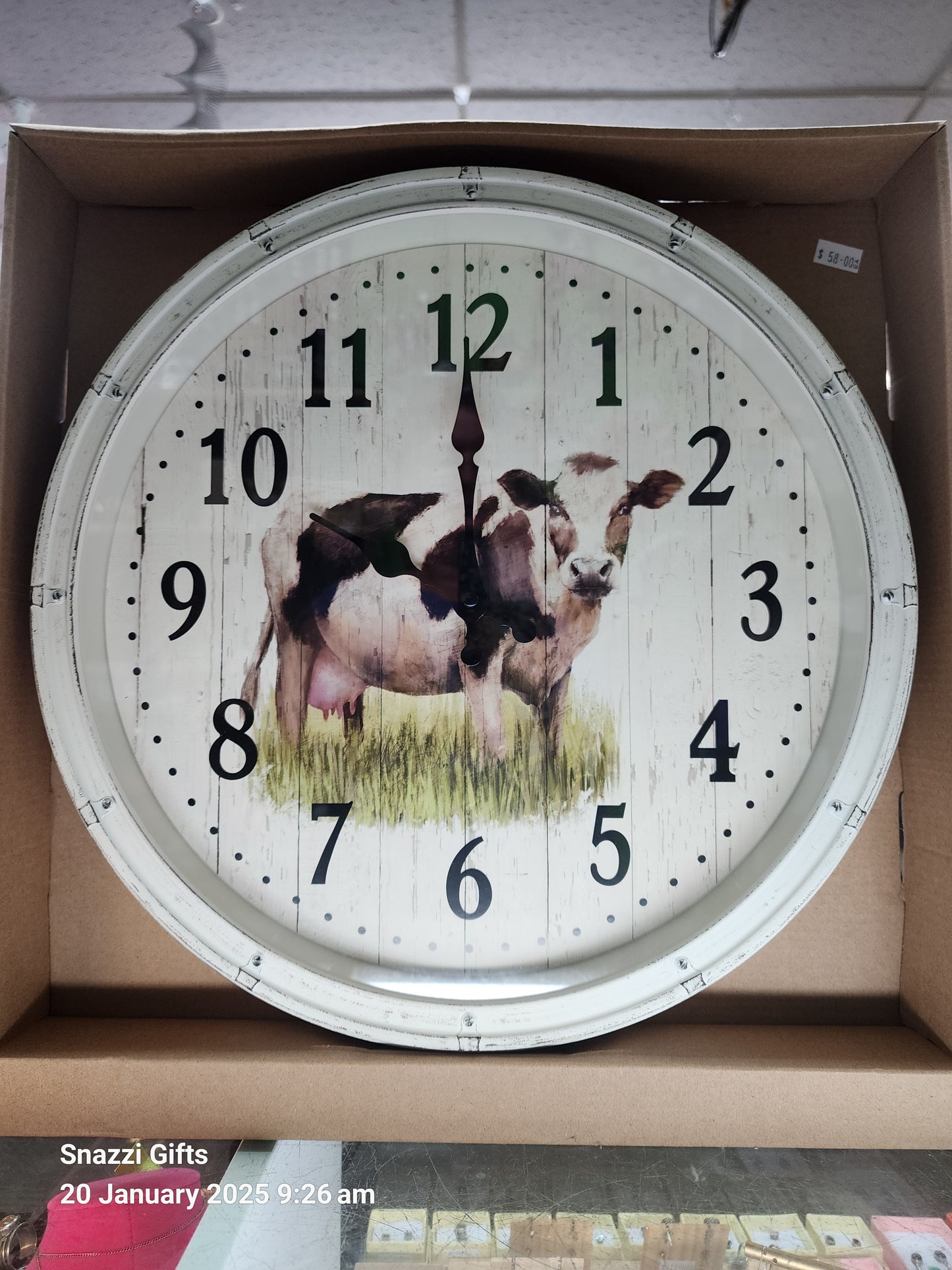 Cow in paddock Clock