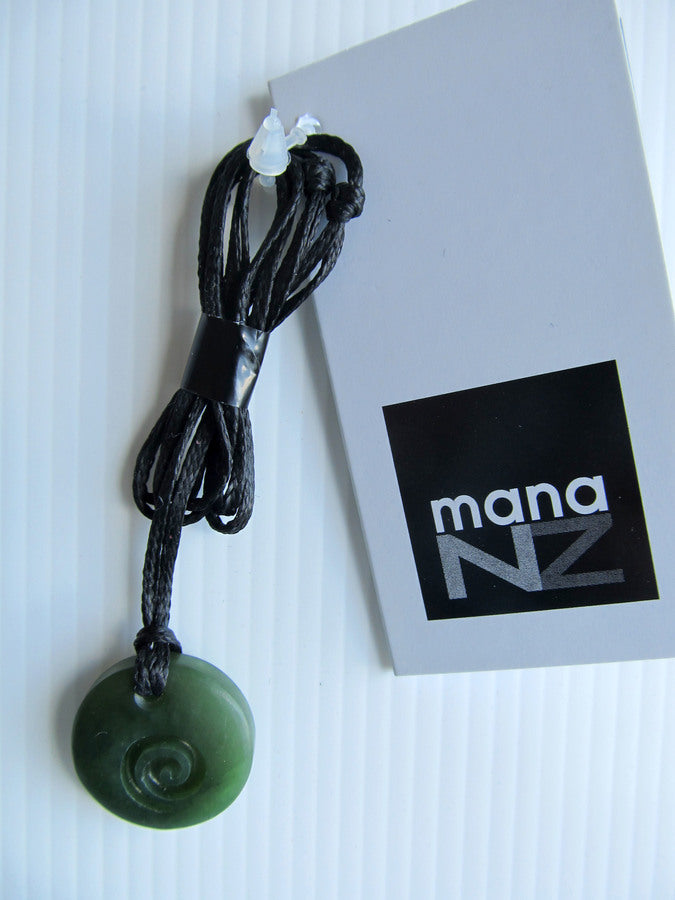 ROUND GREENSTONE PENDANT WITH KORU CARVED INTO IT