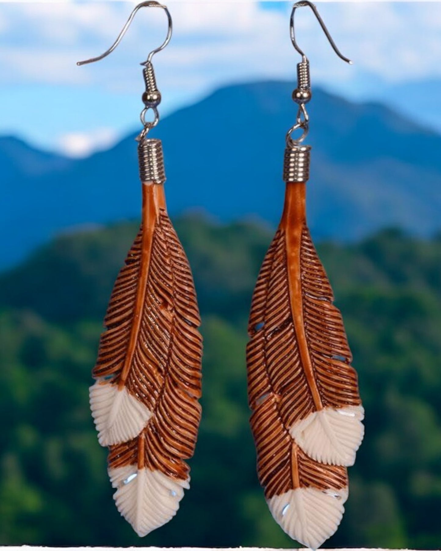 Brown Huia Feather earrings