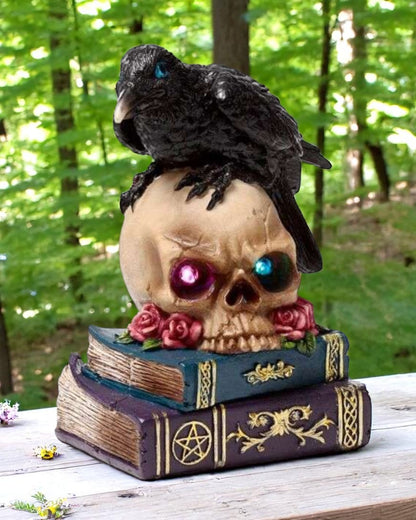 Crow Perched on LED Skull & Books