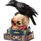 Crow Perched on LED Skull & Books
