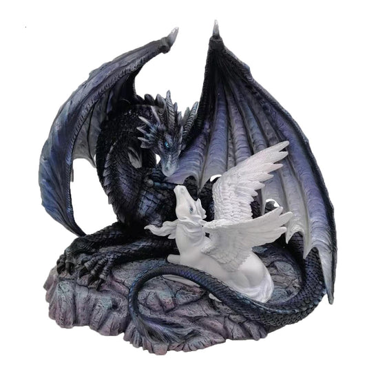 This fearless towering dragon is protecting the baby Pegasus from danger. Cast in the finest resin before being hand-painted. H:31 x W:27 x D:36 cm